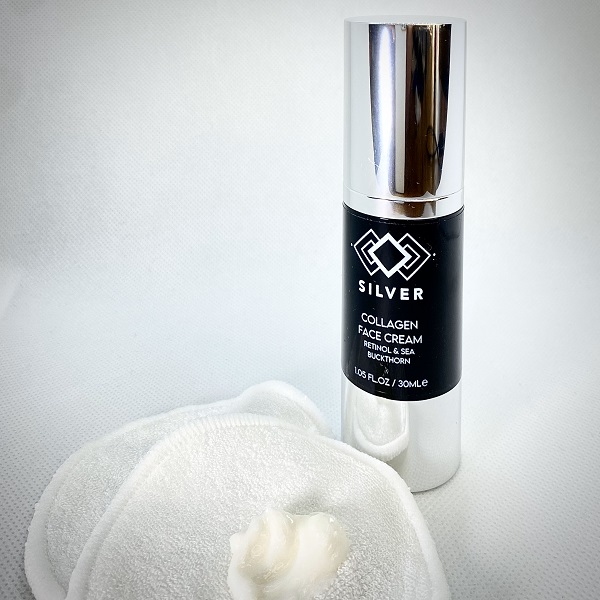 Silver Pro-Ageing Collagen Face Cream with Retinol and Sea Buckthorn - single bottle showing some cotton wipes and cream dispensed
